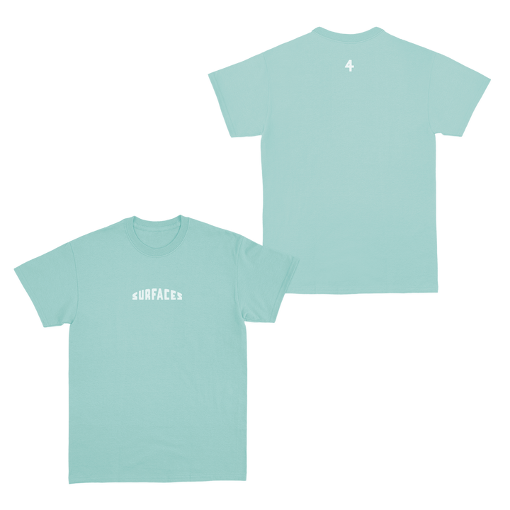 Green t-shirt with the word Surfaces on the front and the number 4 small on the back just beneath the back collar